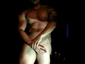 A wild muscled go-go stripper teases the crowds with his horny hard cock!
