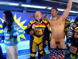 A bobsled team member strips naked on live TV after their team won the race!