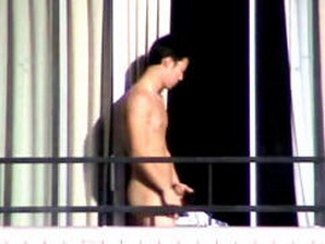 A sexy Asian guy caught naked on the balcony after coming back from the beach...