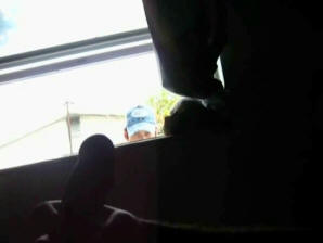 A guy gets caught jerking at the window by a guy walking by!