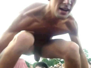 A cute guy strips naked at an open air concert!